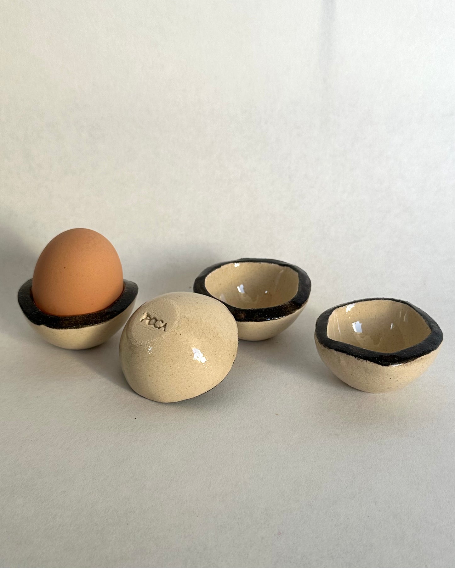 The Nest - set of 4 black egg cups